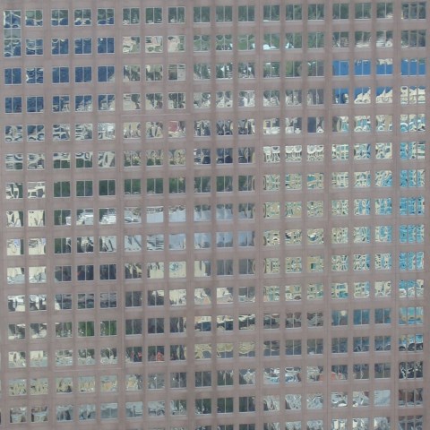 p0255: semi-abstract photo (reflections in skyscraper windows) by Ewart Shaw