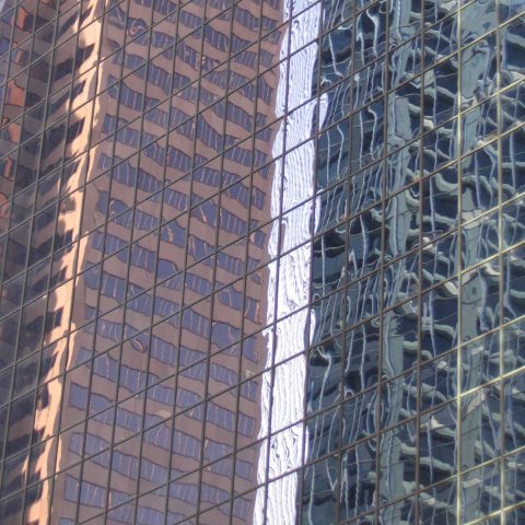 p0258: semi-abstract photo (reflections in skyscraper windows) by Ewart Shaw