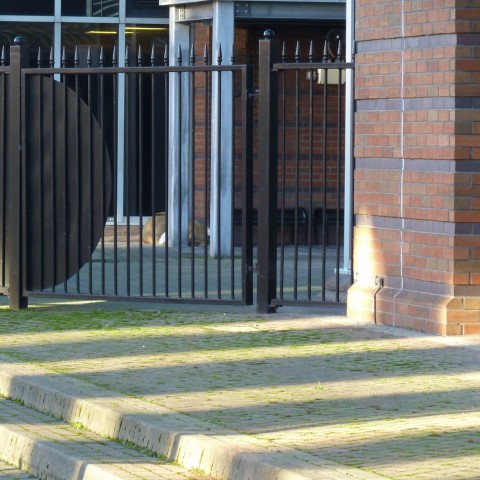 t20549: semi-abstract photo (stripey shadows etc. in Leeds) by Ewart Shaw